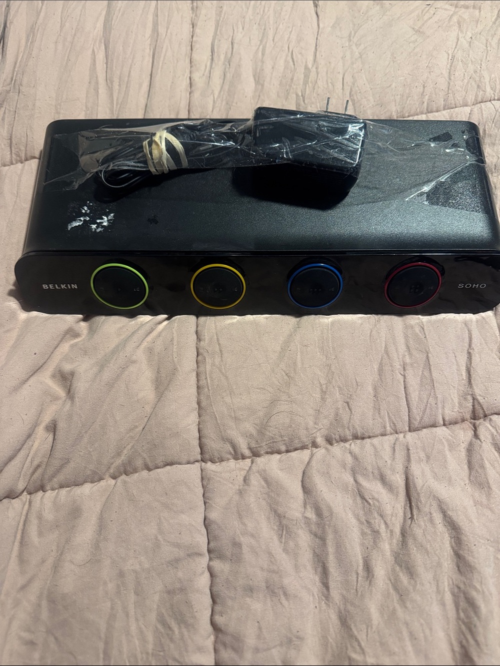Belkin Black 4-Port Power Strip with Green Yellow Blue Red Ringed Outlets